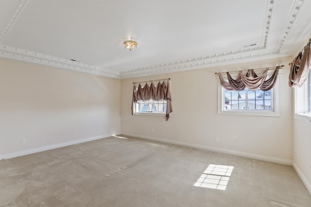 empty room featuring light carpet, baseboards, and visible vents
