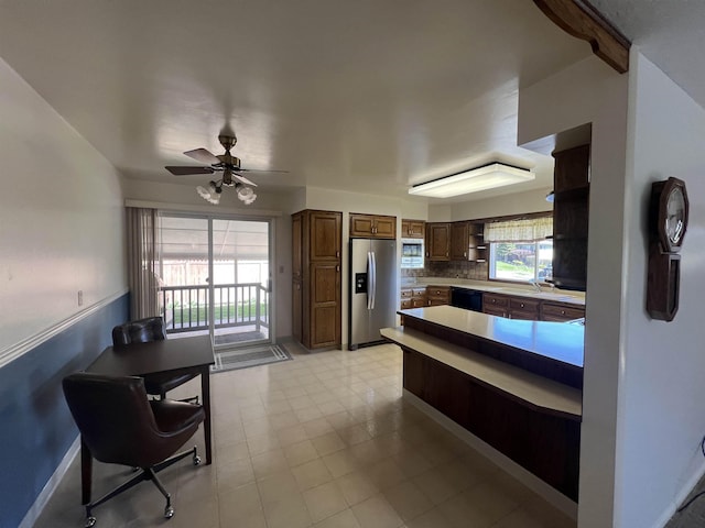 825 N Jefferson St, Colville, WA 99114 - kitchen featuring a ceiling fan, open shelves, dishwasher, a peninsula, and stainless steel refrigerator with ice dispenser