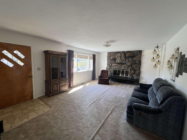 825 N Jefferson St, Colville, WA 99114 - living room with a fireplace and carpet floors