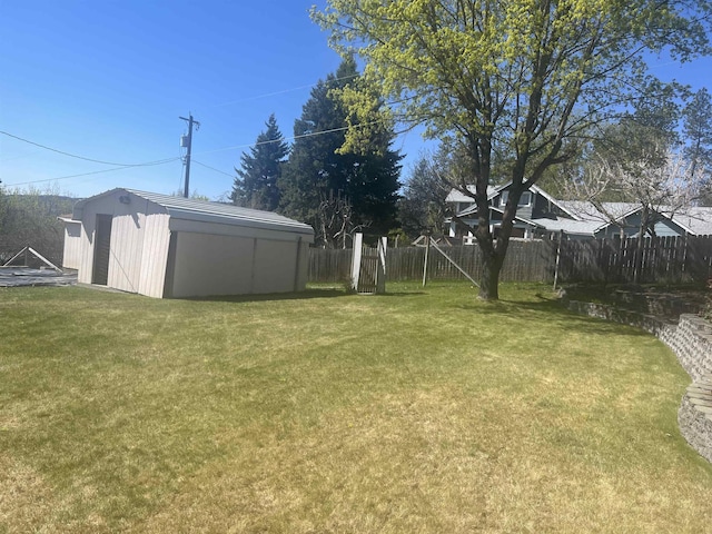 825 N Jefferson St, Colville, WA 99114 - view of yard with an outdoor structure, a shed, and fence