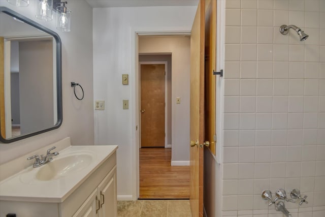 403 W Chestnut St, Almira, WA 99103 - bathroom featuring vanity, baseboards, and tile patterned flooring