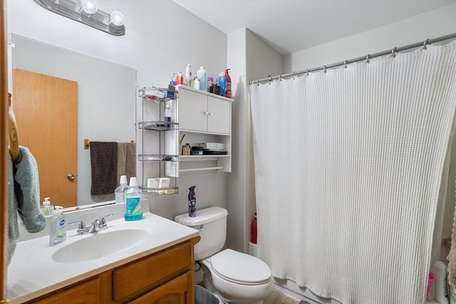 full bathroom with a shower with shower curtain, toilet, and vanity