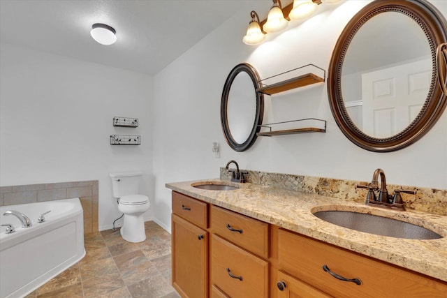 5818 S Abbott Rd, Spokane, WA 99224 - bathroom featuring double vanity, a bath, toilet, and baseboards