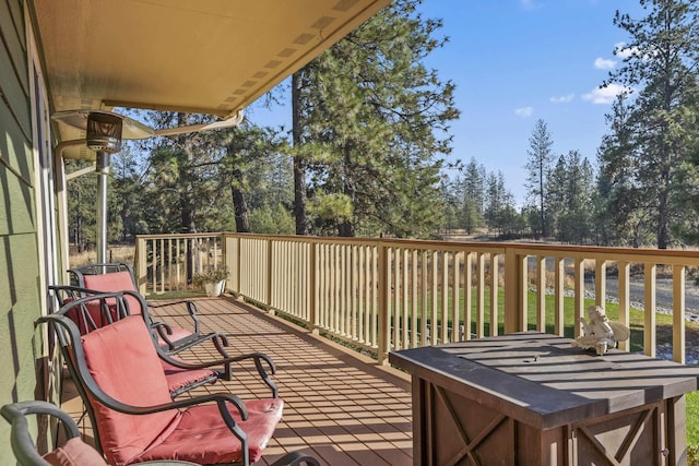 5818 S Abbott Rd, Spokane, WA 99224 - wooden deck featuring view of wooded area