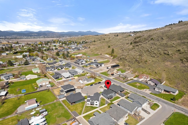 bird's eye view featuring a mountain view and a residential view