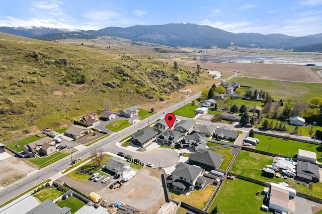 drone / aerial view featuring a mountain view