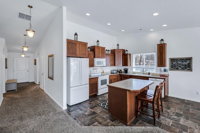 kitchen with high vaulted ceiling, baseboards, visible vents, and white appliances