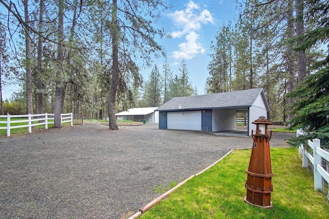21203 W Beechwood Rd, Medical Lake, WA 99022 - garage featuring fence and a detached garage