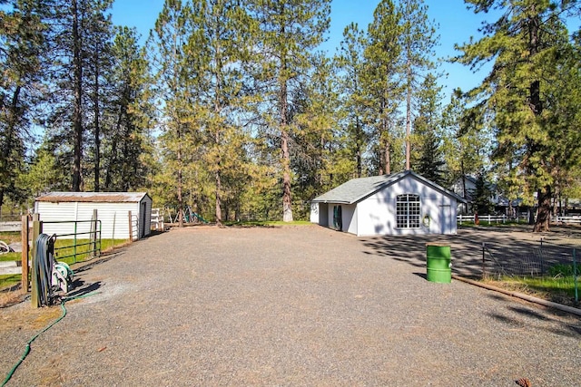 21203 W Beechwood Rd, Medical Lake, WA 99022 - view of street featuring view of wooded area