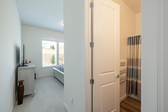 full bath with baseboards