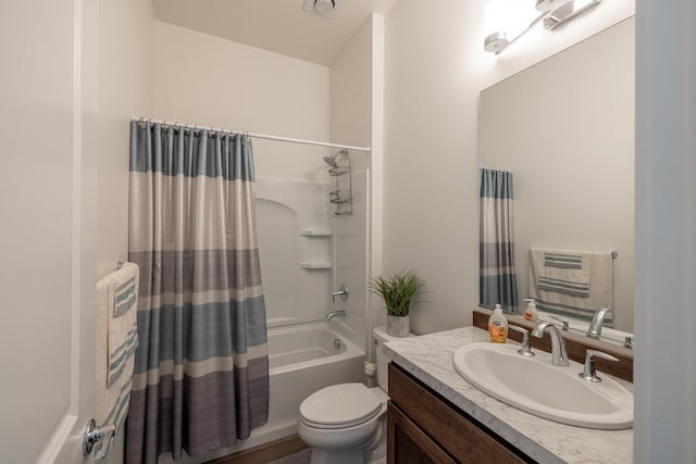 full bath featuring shower / bath combination with curtain, toilet, and vanity