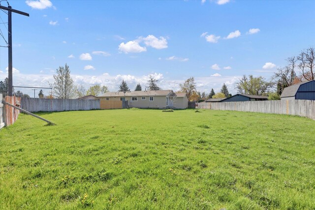 view of yard featuring fence