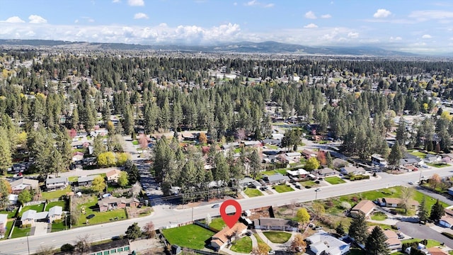 bird's eye view featuring a view of trees
