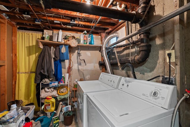laundry area with separate washer and dryer and laundry area