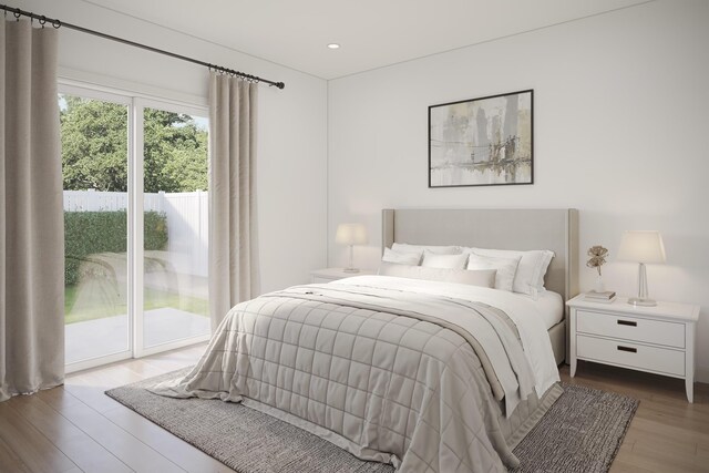 bedroom featuring wood finished floors, access to outside, and recessed lighting