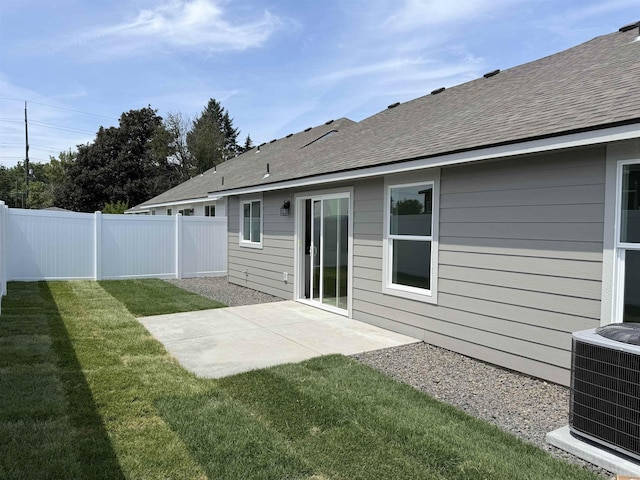 9520 E Michielli Ln, Spokane Valley, WA 99206 - rear view of house with a patio area and a shingled roof