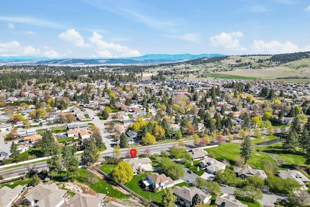 bird's eye view with a residential view and a mountain view