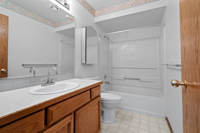 bathroom with tile patterned floors, bathing tub / shower combination, backsplash, toilet, and vanity