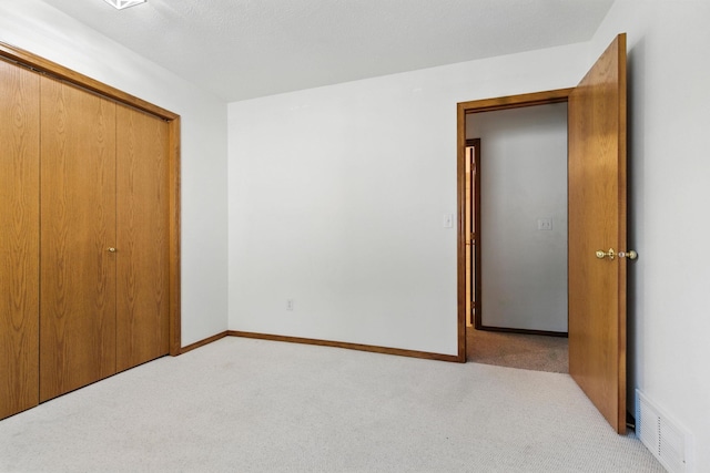 4604 E Birkdale Ln, Spokane, WA 99223 - unfurnished bedroom featuring carpet floors and a closet