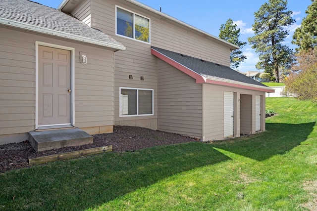4604 E Birkdale Ln, Spokane, WA 99223 - back of house featuring a yard and a shingled roof
