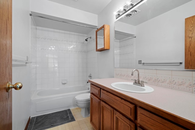 full bath with  shower combination, toilet, decorative backsplash, tile patterned flooring, and vanity