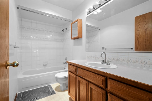 full bathroom featuring decorative backsplash, toilet, vanity, and shower / tub combination