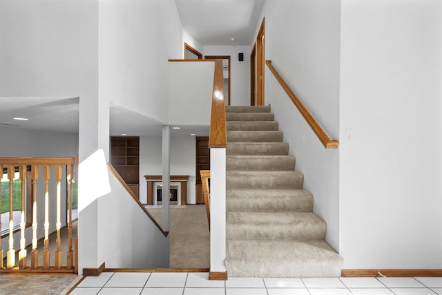 4604 E Birkdale Ln, Spokane, WA 99223 - staircase with a high ceiling and baseboards