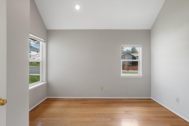 9701 W Masters Ln, Cheney, WA 99004 - spare room with plenty of natural light, light wood-type flooring, and lofted ceiling