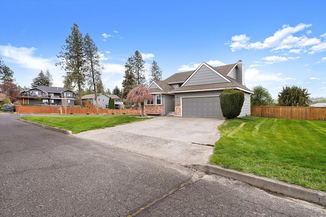 9701 W Masters Ln, Cheney, WA 99004 - view of front of house with an attached garage, concrete driveway, a chimney, a shingled roof, and a residential view