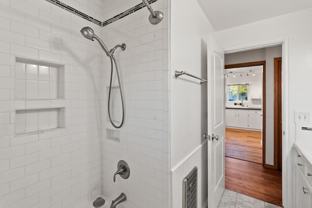 full bath with shower / bath combination and a sink