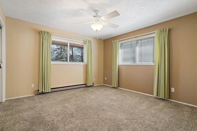 unfurnished room featuring a baseboard radiator, a textured ceiling, carpet flooring, and ceiling fan