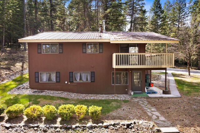 exterior space with metal roof