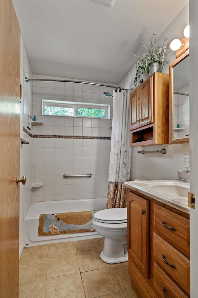 full bath featuring tile patterned flooring, toilet, and vanity