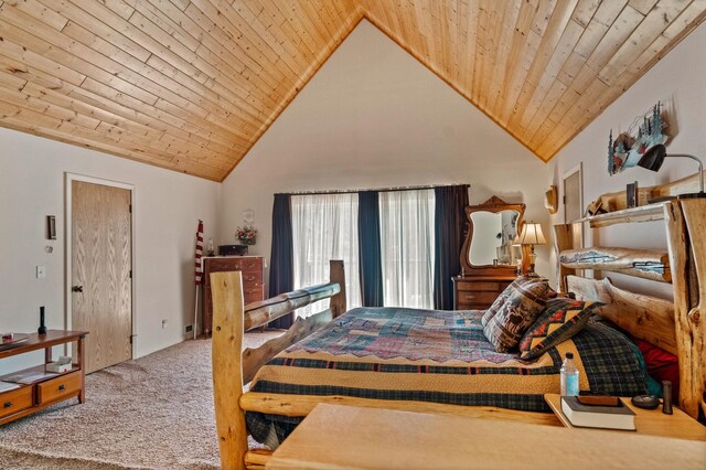 carpeted bedroom with high vaulted ceiling and wooden ceiling