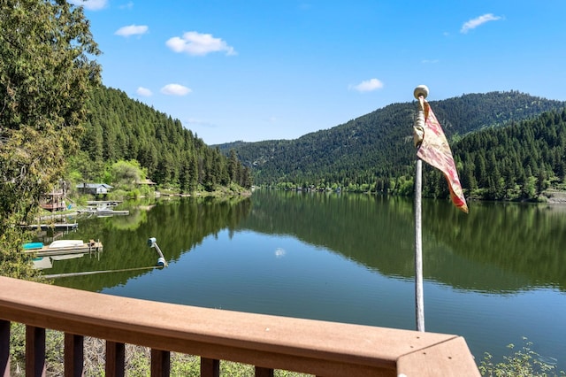 2876 Deep Lake S Shore Rd, Colville, WA 99114 - dock featuring a wooded view and a water and mountain view
