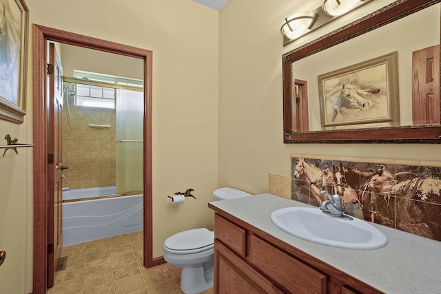 4127 S Sullivan Rd, Veradale, WA 99037 - full bath with shower / bath combination with glass door, toilet, vanity, and tile patterned floors