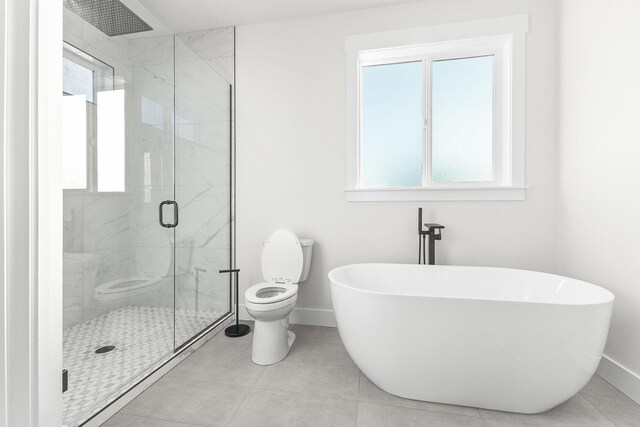 full bath featuring plenty of natural light, toilet, baseboards, and a marble finish shower