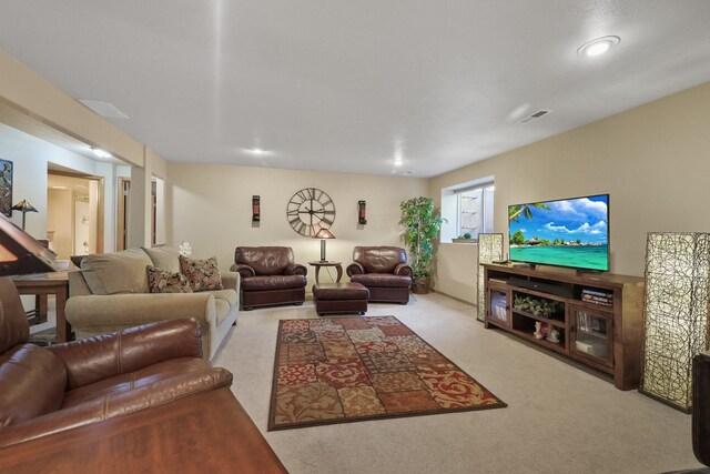 living room featuring visible vents and carpet floors
