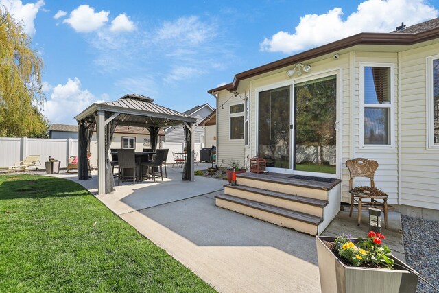 view of patio / terrace with a gazebo and fence