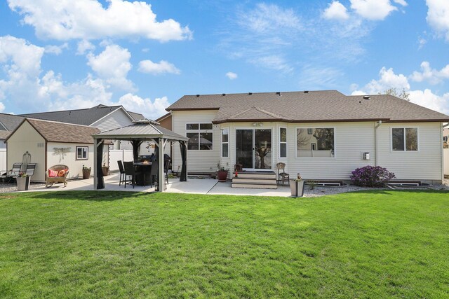 back of house with a patio area, entry steps, a yard, and a gazebo