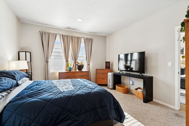 18706 E Flat Rock River Ave, Spokane Valley, WA 99016 - bedroom featuring visible vents, carpet flooring, and baseboards