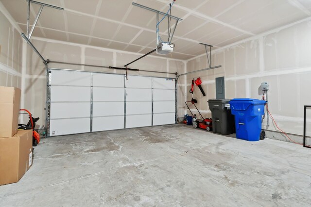 18706 E Flat Rock River Ave, Spokane Valley, WA 99016 - garage featuring a garage door opener and electric panel