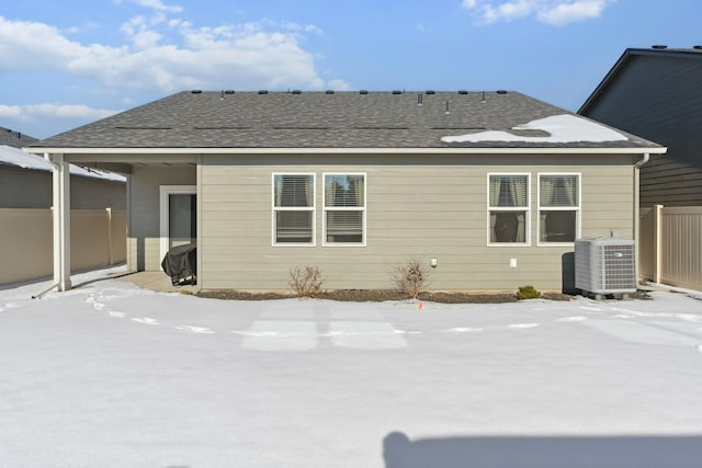 18706 E Flat Rock River Ave, Spokane Valley, WA 99016 - snow covered rear of property featuring central AC unit and fence