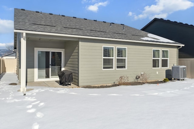 18706 E Flat Rock River Ave, Spokane Valley, WA 99016 - snow covered rear of property with central AC and fence