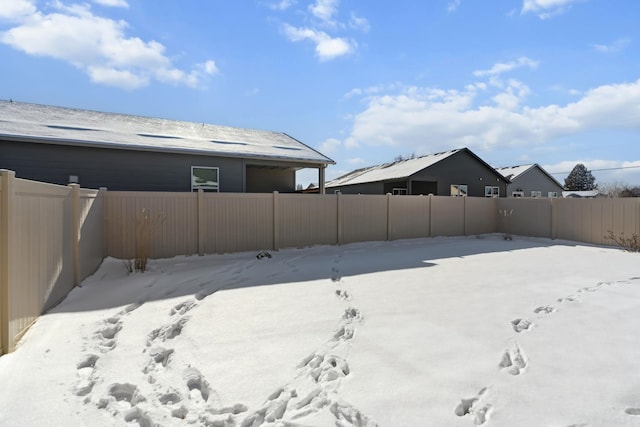 18706 E Flat Rock River Ave, Spokane Valley, WA 99016 - yard layered in snow featuring a fenced backyard