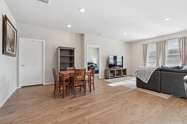 18706 E Flat Rock River Ave, Spokane Valley, WA 99016 - dining space with light wood-style flooring, baseboards, and recessed lighting