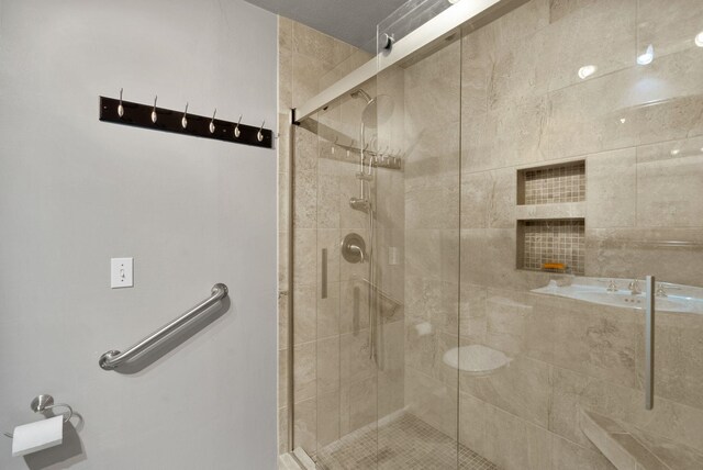 bathroom featuring a shower stall
