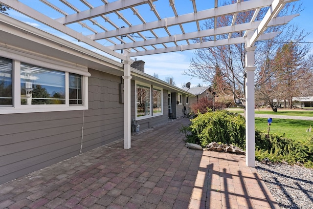 view of patio featuring a pergola