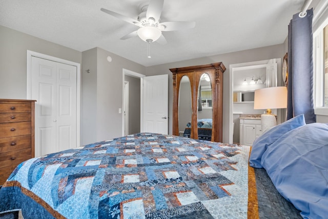 bedroom with a ceiling fan and connected bathroom