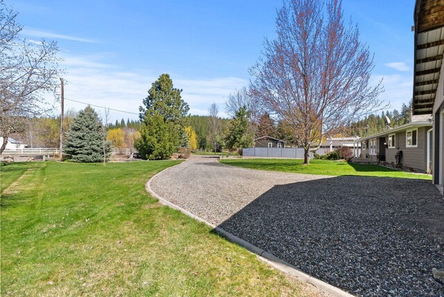 view of yard featuring fence